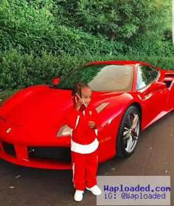 Tyga shows off his son and his Ferrari